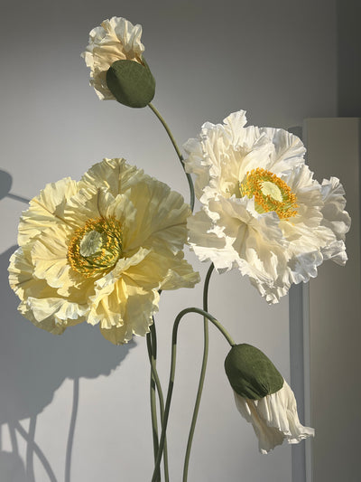 Oversized, free-standing paper poppies - perfect for event decor and adding a touch of artistry to any space.