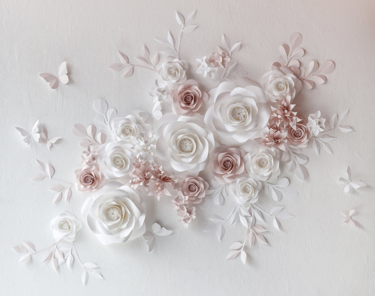 Captivating floral arrangement of paper flowers for a picture-perfect wedding
