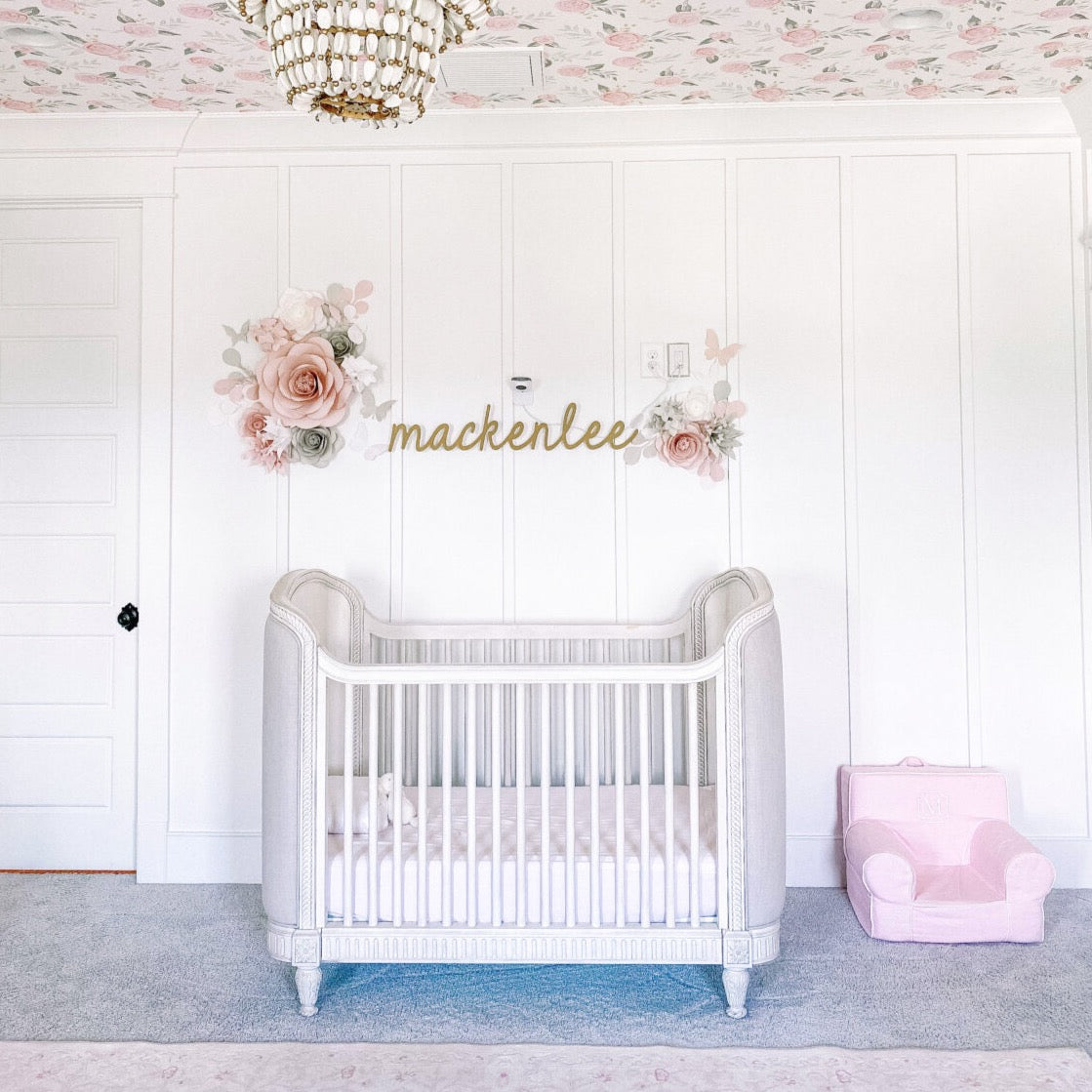 Close-up of Angela Lanter's Toddler Bedroom: Paper Flower Arrangement Over the Bed