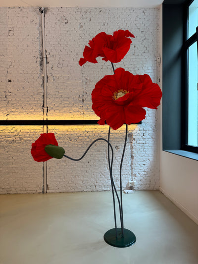 Red paper poppies set up
