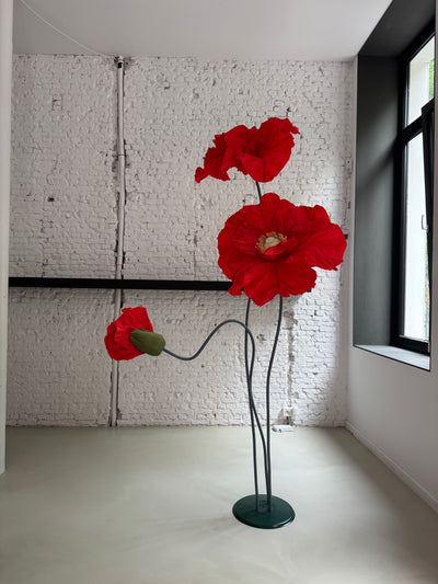 Red paper poppies set up