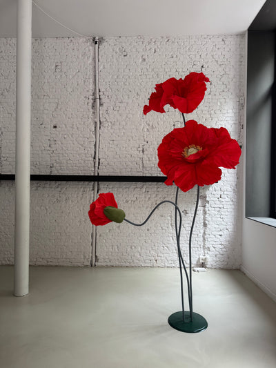 Red paper poppies set up