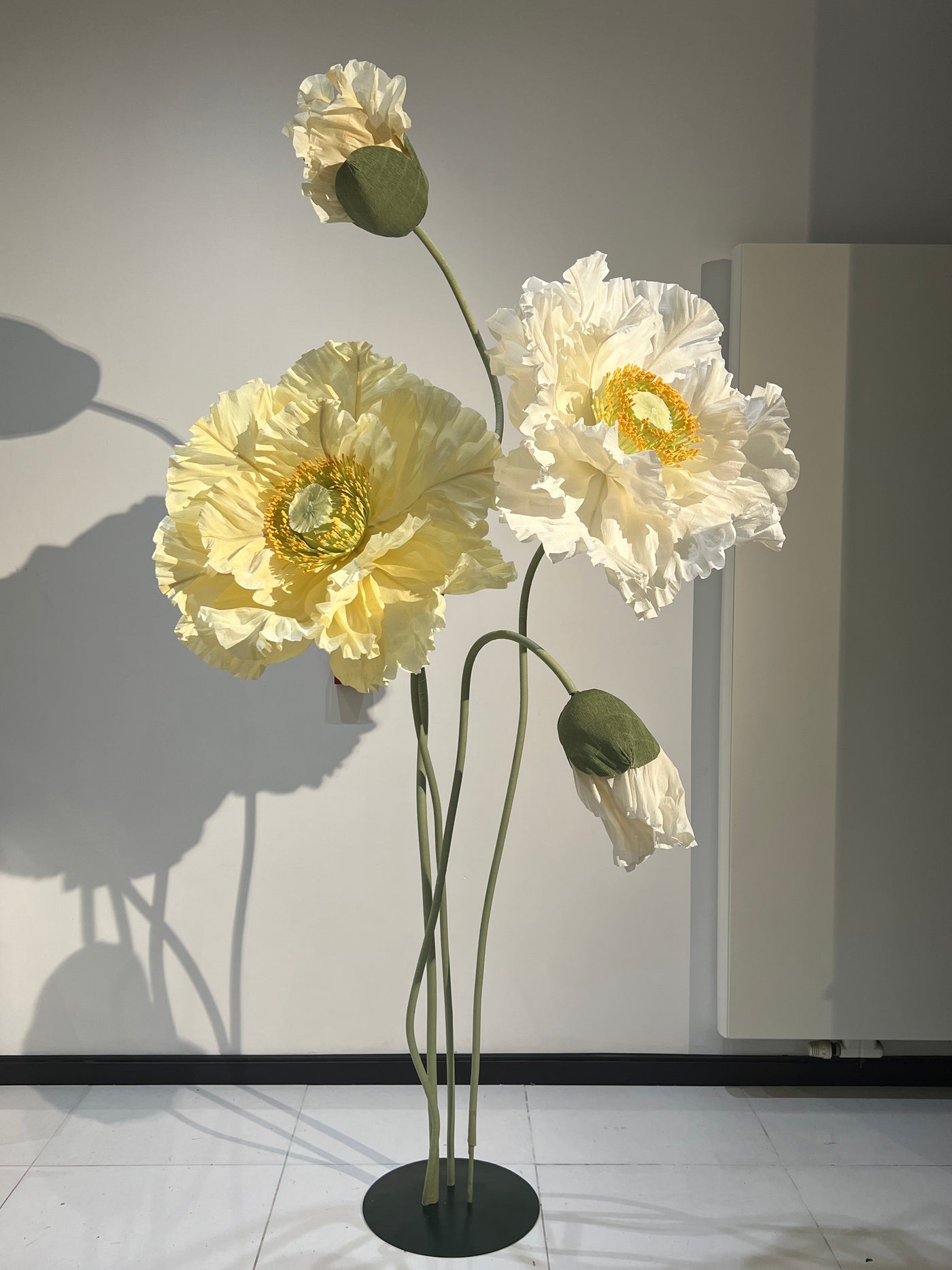 Event-ready oversized paper poppies - a stunning addition to any setting.