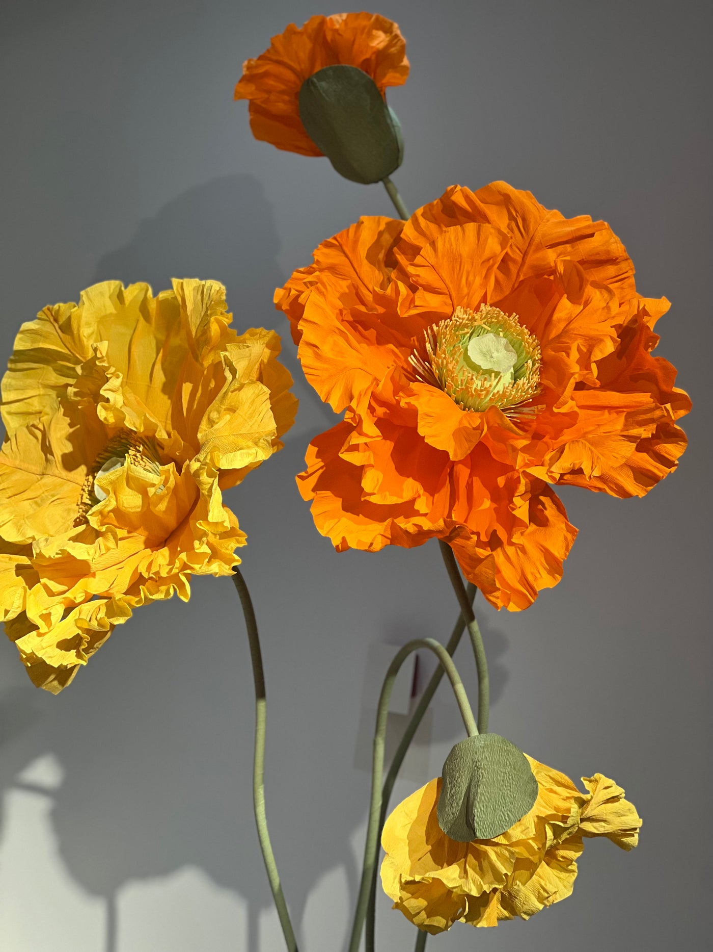 Unforgettable Weddings: Vibrant Orange and Yellow Standing Paper Flowers
