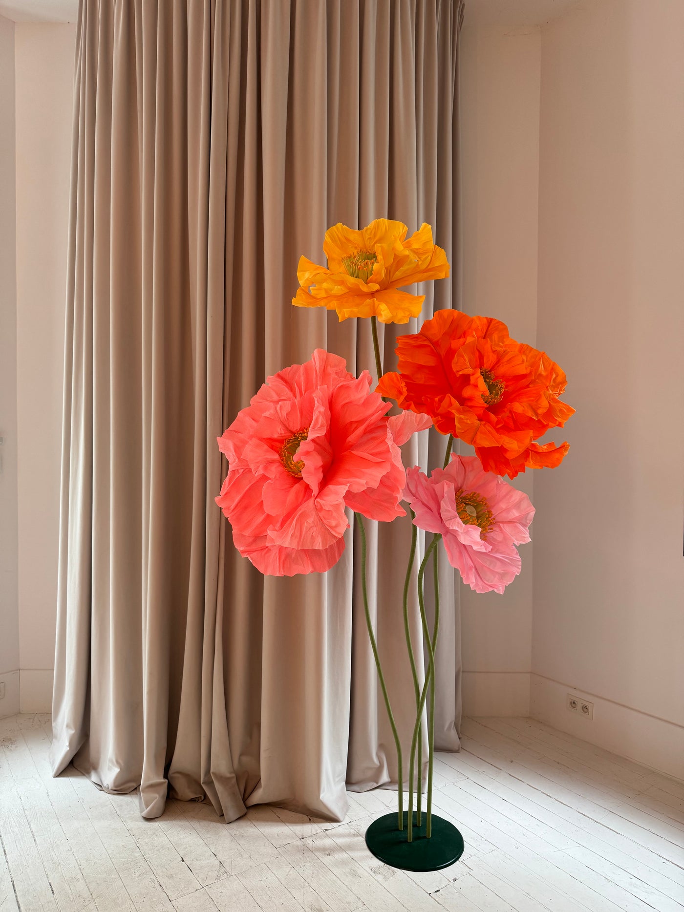 Large paper poppies in vibrant bright pink, perfect for standing displays