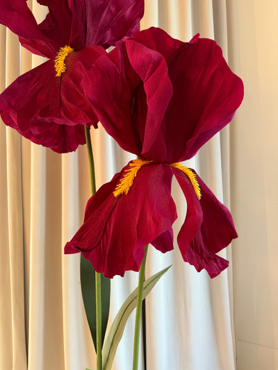 Large wine paper flowers with green leaves