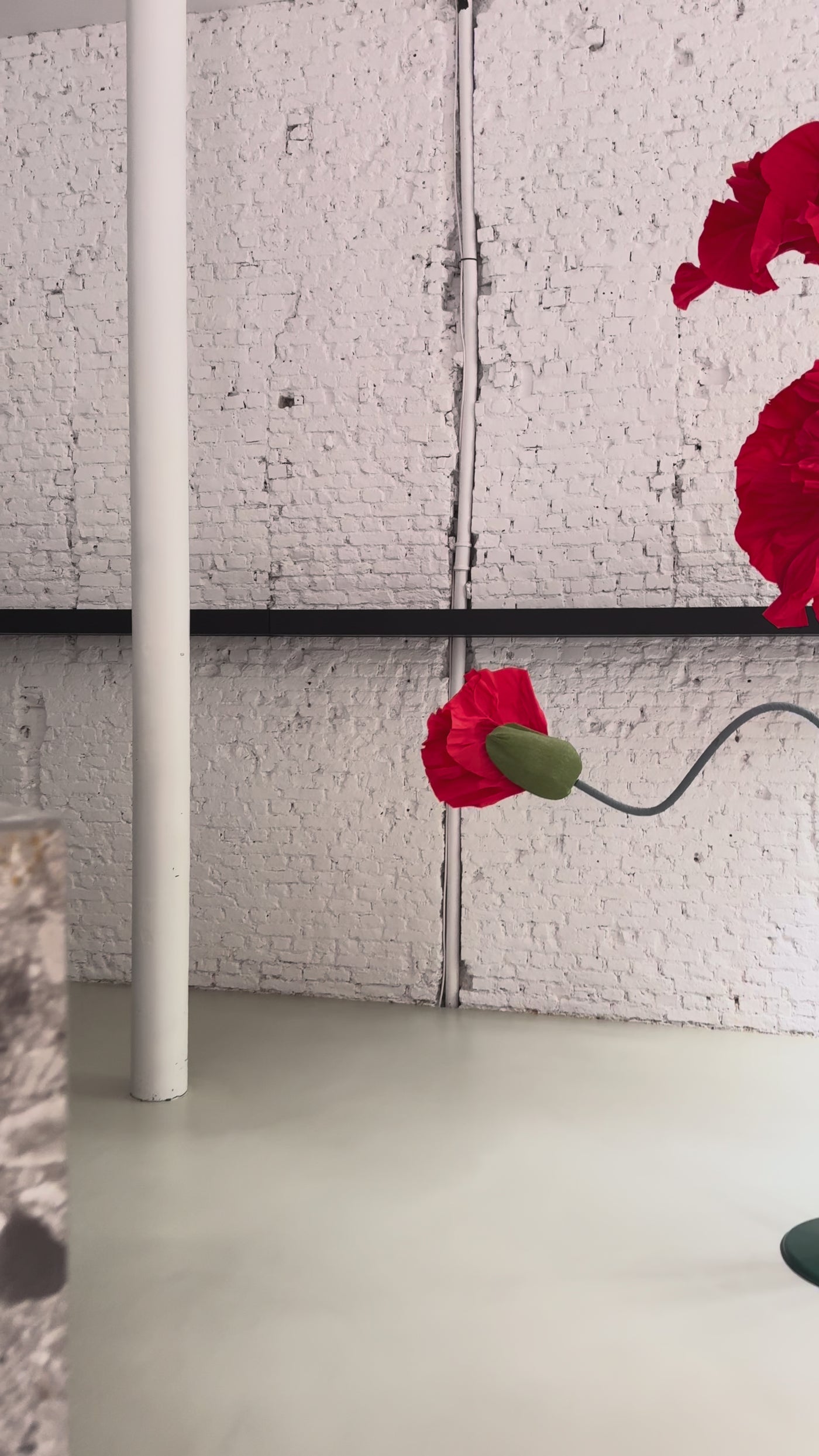 Red paper poppies set up