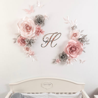 Close-up of delicate blush, light grey, and nude flowers for nursery decor