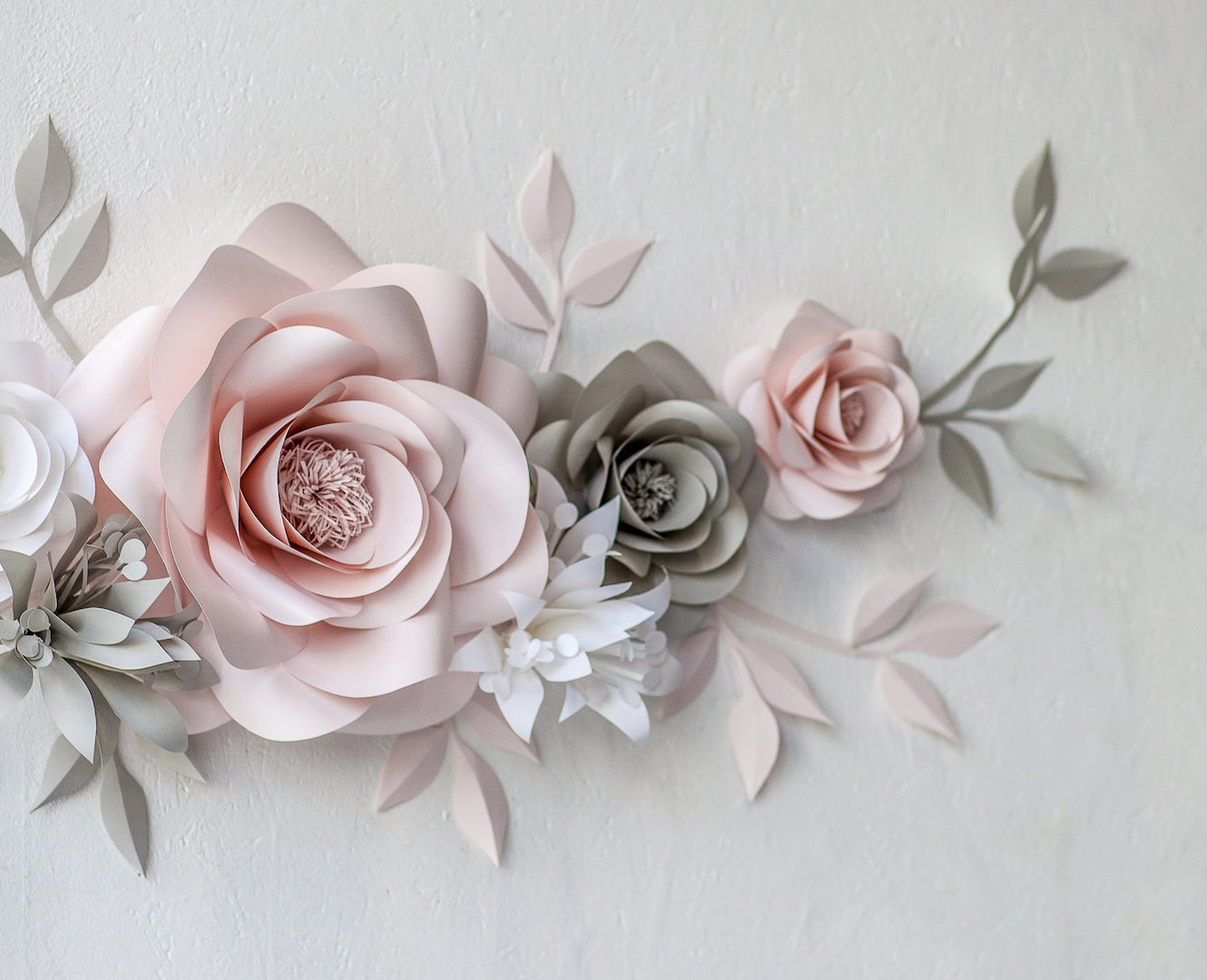 Enhance your baby's room with the subtle elegance of Blush, White, and Light Grey nursery wallpaper flowers