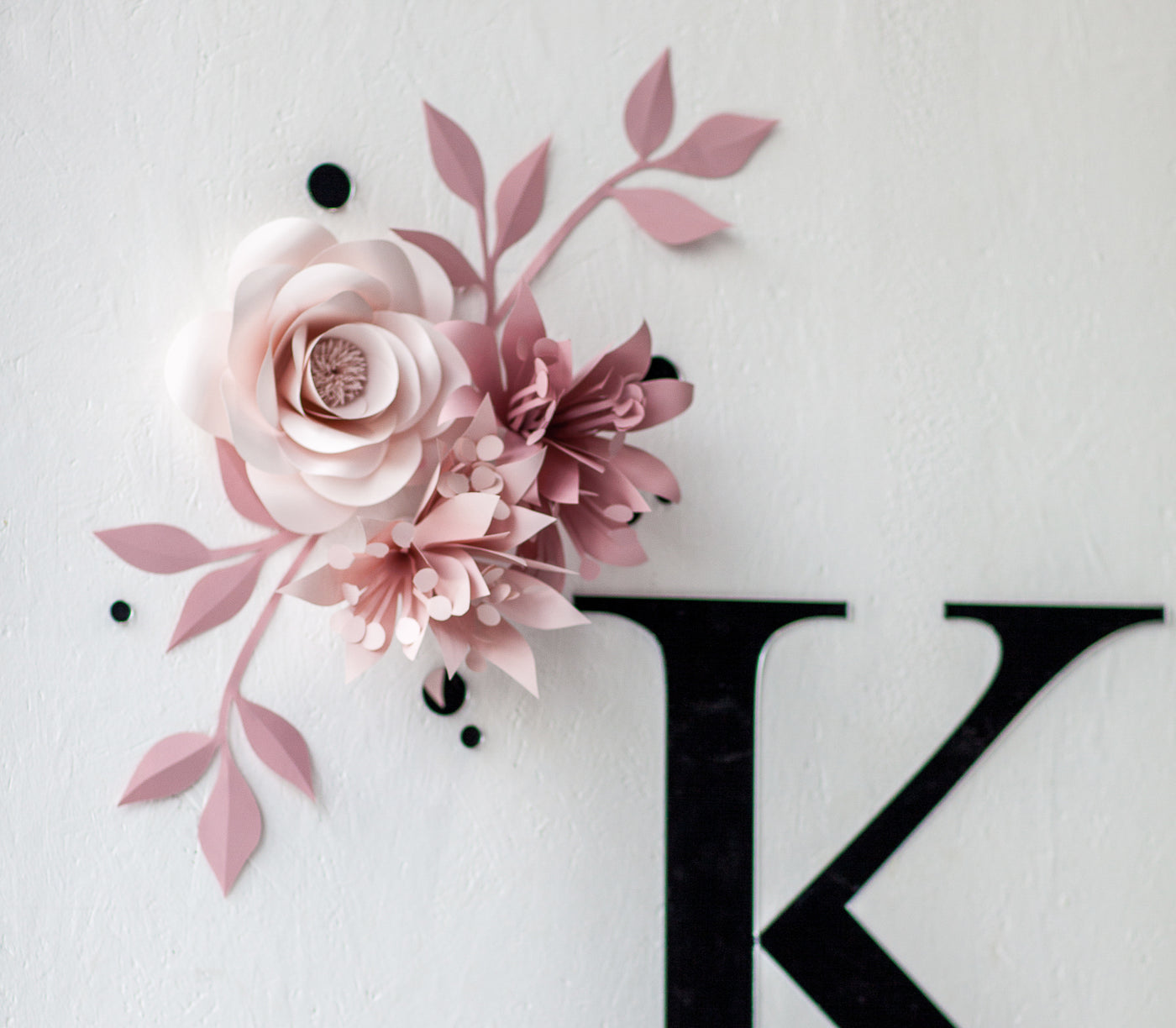 Captivating Arrangement: 3 Paper Flowers on Each Side of the Initial Sign for a Striking Display