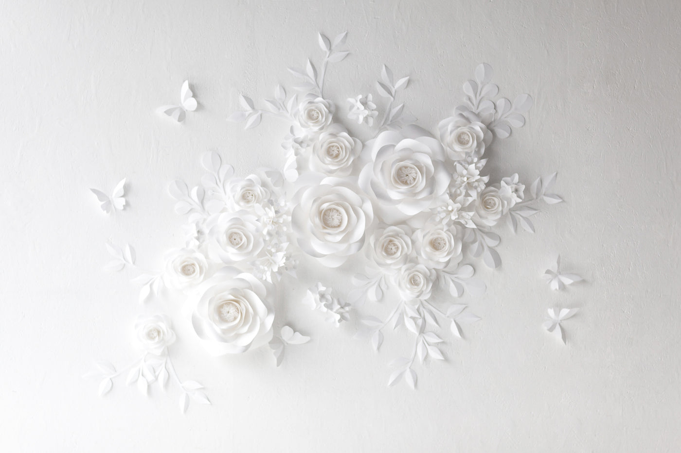 Pure Serenity: White Paper Flowers as a Backdrop for Creating a Tranquil Setting