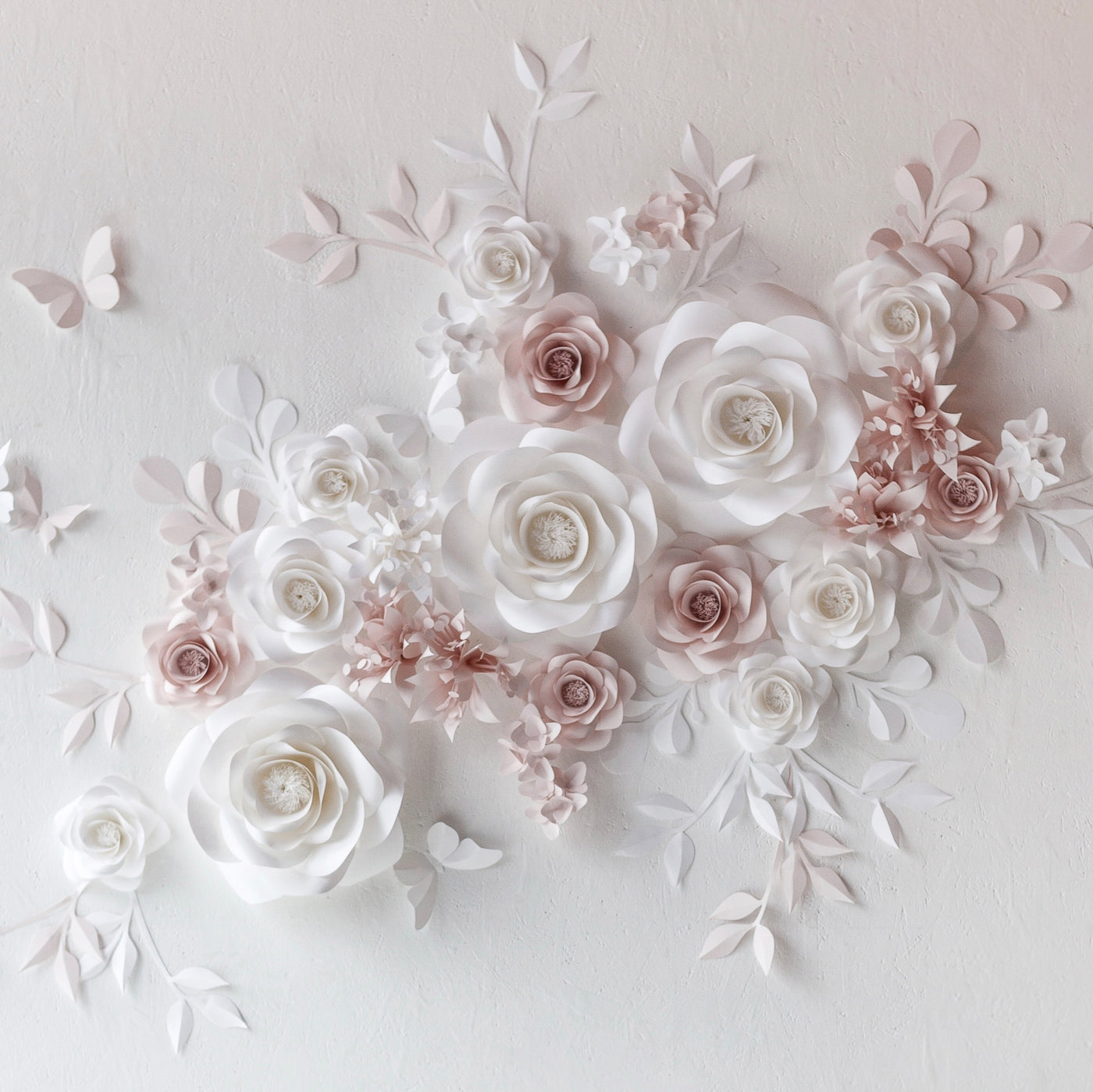 Close-up of intricately crafted paper flowers for a stunning wedding backdrop