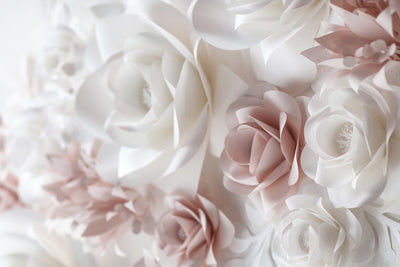 Handcrafted paper flowers creating a mesmerizing backdrop for your special day