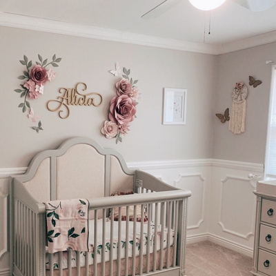 Blush nude misty rose paper flowers, a delicate and elegant choice for nursery decor, adding a soft and soothing touch to the ambiance.